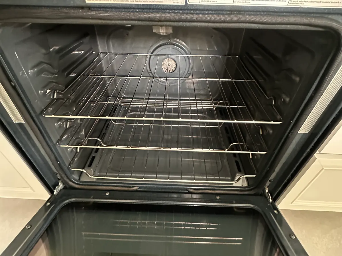 Inside of the same oven after cleaning
