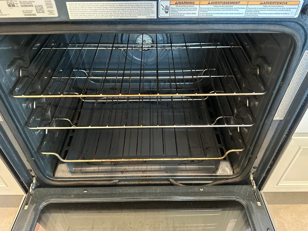 Inside of an oven before cleaning