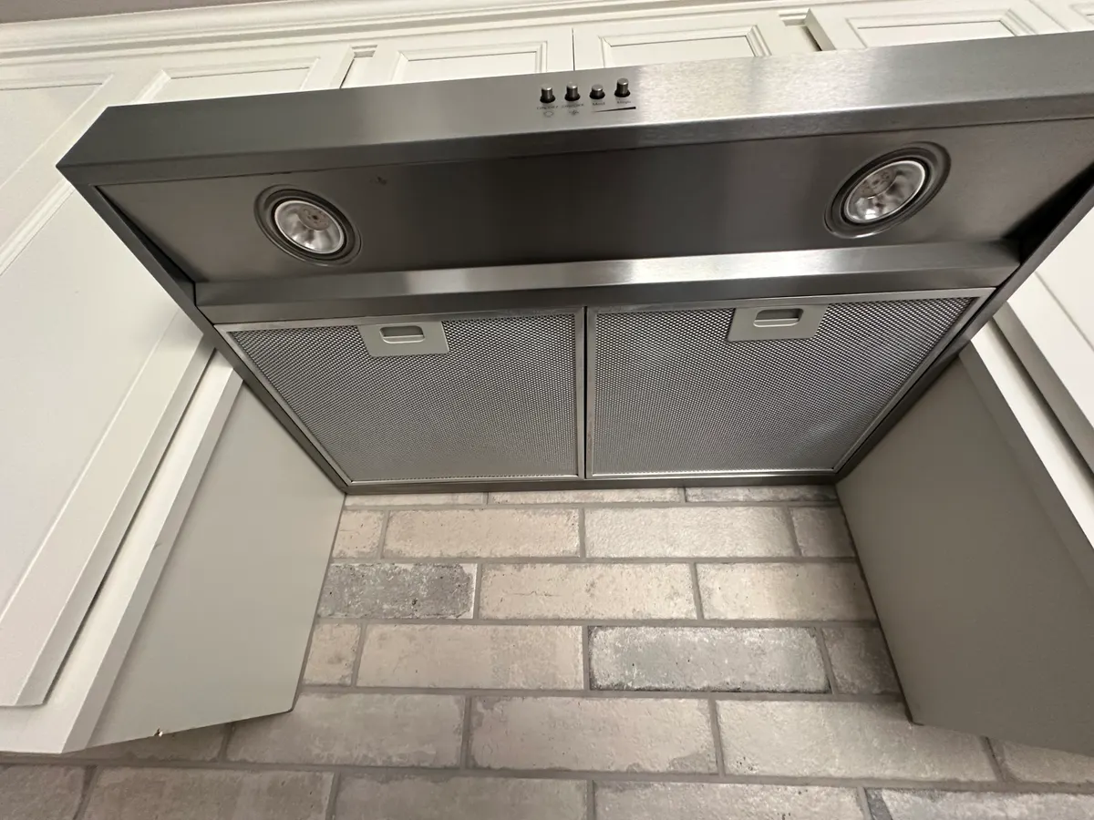 The same range hood after a Babcock Cleaning Services visit
